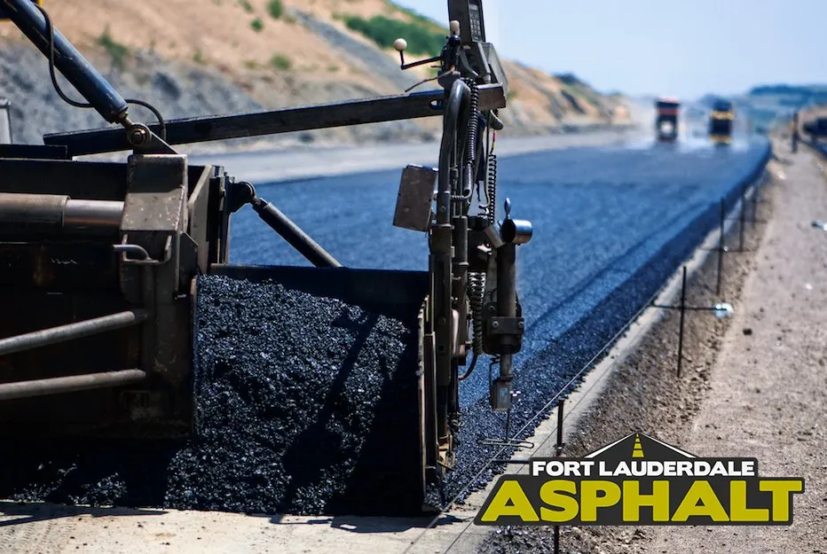 Paving machine resufacing a private road in Broward County, South Florida